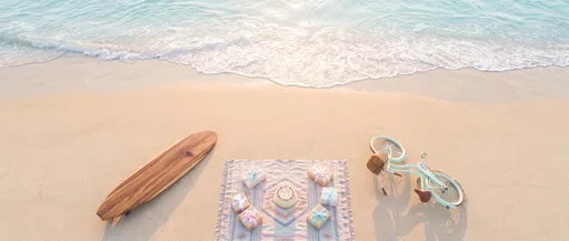 Aerial Beach Birthday Picnic with Surfboard