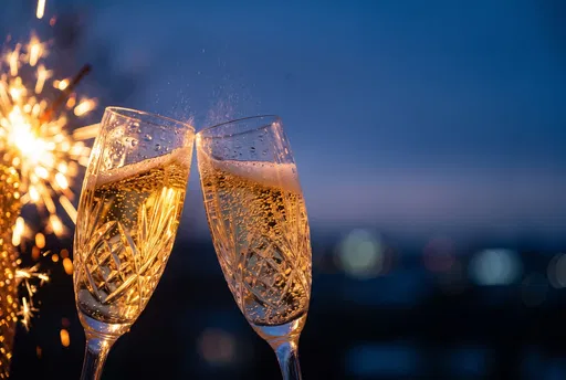 Crystal Champagne Flutes Clinking With Sparkler