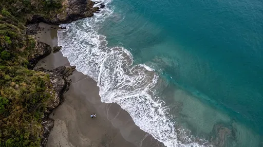 Aerial Cove with Heart-Shaped Wave Foam