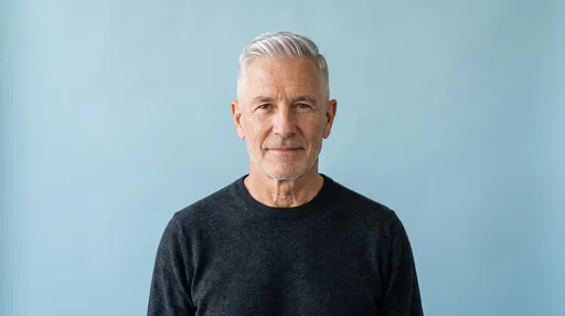 Studio Portrait of Silver-Haired Senior Man
