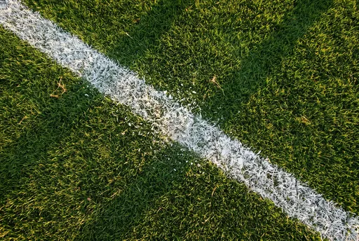 Overhead White Chalk Line on Green Turf