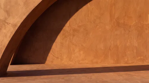 Sunlit Terracotta Plaster Wall and Arch