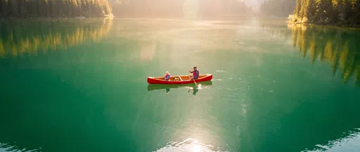 Father and Child Canoeing on Emerald Lake