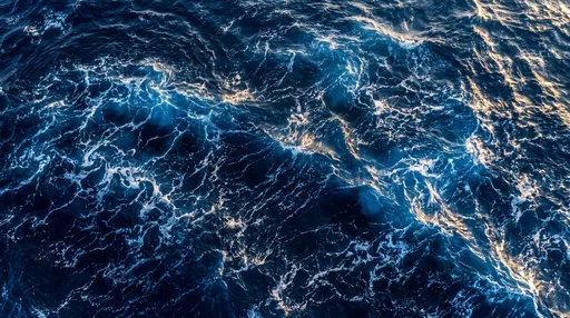 Aerial View of Deep Blue Ocean Waves