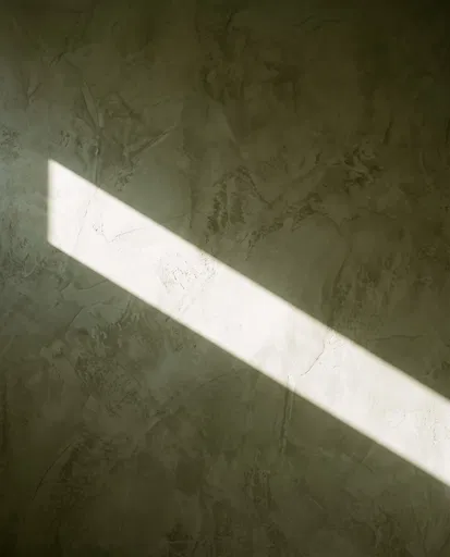 Army Green Plaster Wall With Sunlight
