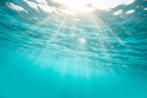 Underwater Sunbeams in Clear Turquoise Water
