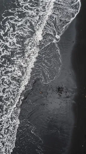 Top-Down Waves on Black Sand Beach