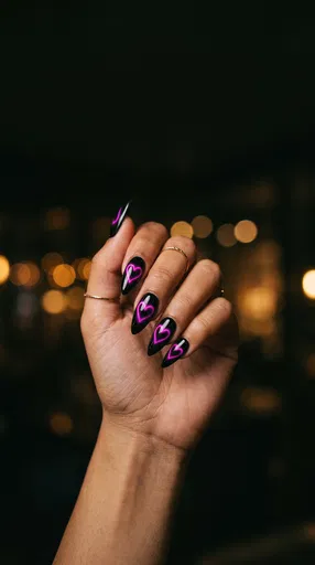Black Stiletto Nails With Neon Hearts