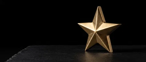 Brushed Brass Star on Dark Stone