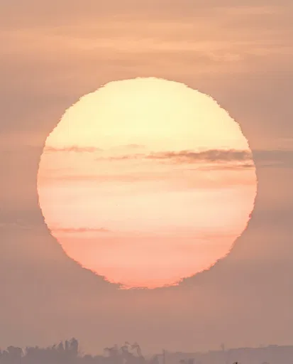 Telephoto Close-Up of Pastel Setting Sun