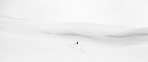 Minimalist Snowboarder Silhouette on White Slope