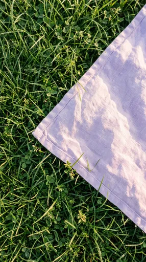 Lilac Linen Blanket on Dewy Grass