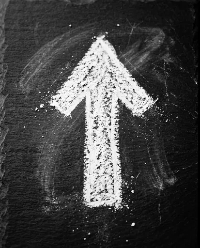 White Chalk Upward Arrow on Slate