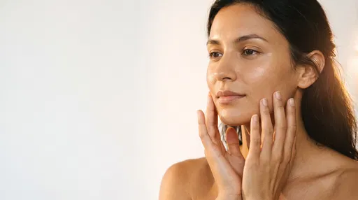 Woman Touching Face in Golden Light