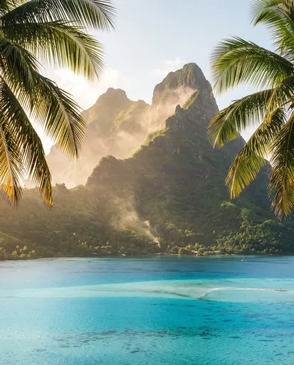 Tropical Lagoon and Volcanic Peaks Framed by Palms