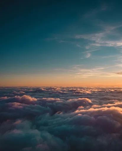 Aerial View Above Sunset Clouds