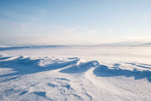 Minimalist White Snow Dunes Under Clear Sky