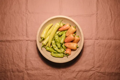 Assorted Fresh Peppers in Wooden Bowl