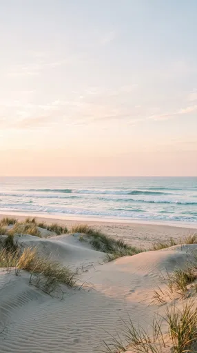 Pastel Sunrise Over Coastal Sand Dunes