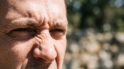 Close-Up of Man Squinting in Disgust