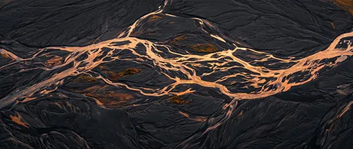 Golden Braided River in Black Sand