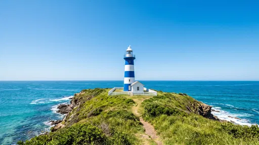 Blue Striped Lighthouse on Coastal Cliff