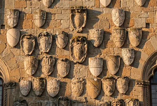 Historic Stone Wall with Heraldic Crests
