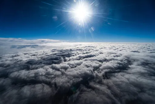 Bright Sunburst Above Dense Cloud Layer