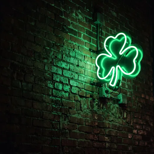Green Neon Shamrock Sign on Brick Wall