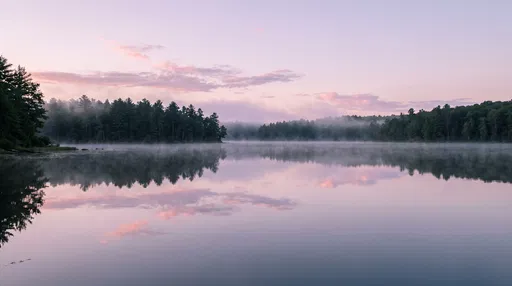 Misty Lake Reflection at Dawn