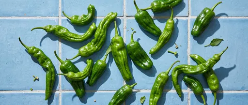 Green Peppers on Blue Ceramic Tile