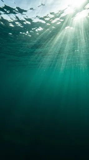 Underwater Sunbeams in Teal Ocean