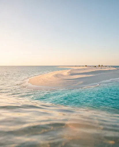 Golden Hour Sandbar Island Over Turquoise Water