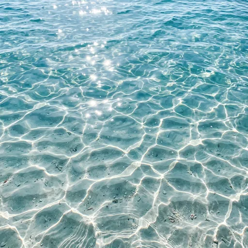 Clear Turquoise Ocean Water with Sunlit Caustics
