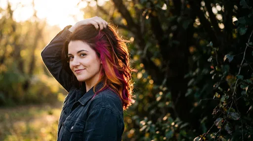 Woman Showing Magenta and Marigold Hair Highlights
