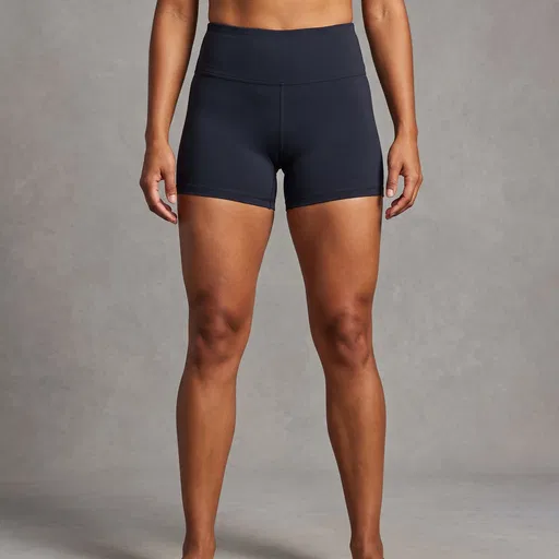 Fit Woman Showing Quadriceps in Studio