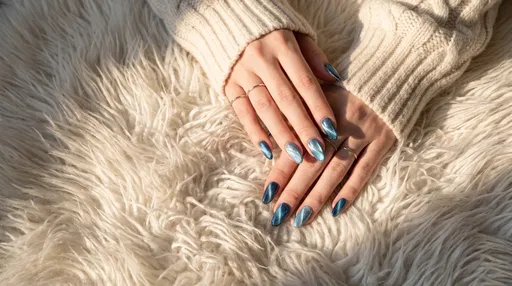 Woman's Hands With Blue Cat-Eye Nails