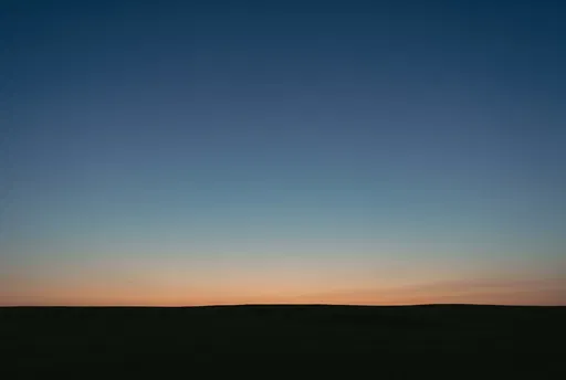 Minimalist Twilight Sky Over Dark Horizon