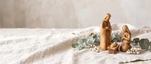 Minimalist Wooden Nativity Scene on Linen