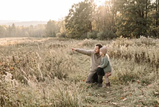 Father and Daughter in Autumn Meadow