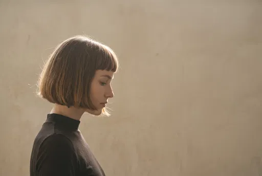 Profile Portrait of Woman with Bob Haircut