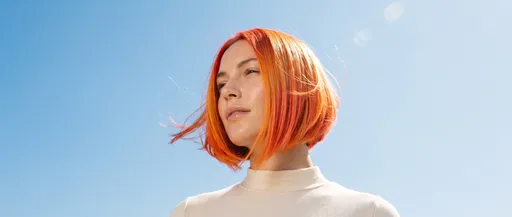 Woman With Vivid Orange Bob Haircut