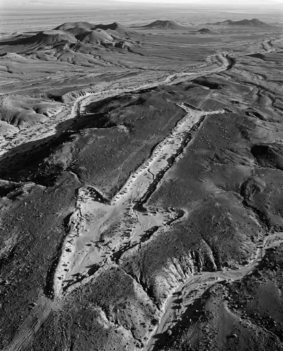 Monochrome Aerial View of Desert Arrow Geoglyph