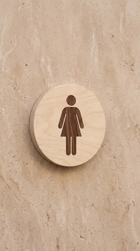 Wooden Women Restroom Sign on Stone Wall