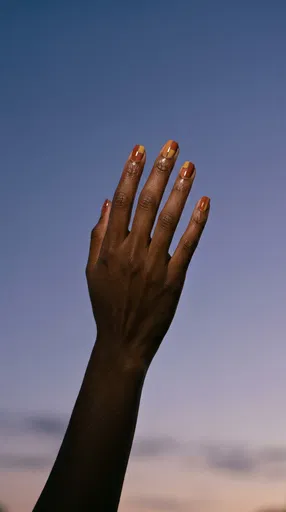 Hand With Geometric Autumn Nail Art