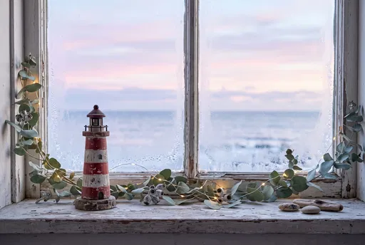Toy Lighthouse on Frosted Winter Windowsill