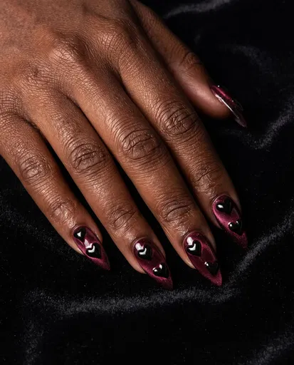Burgundy Stiletto Nails with Black Hearts