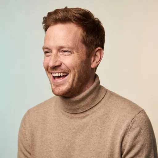 Laughing Man in Beige Turtleneck Portrait