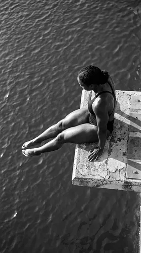 Muscular Swimmer on Concrete Diving Board