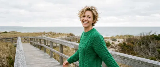 Smiling Woman on Coastal Boardwalk